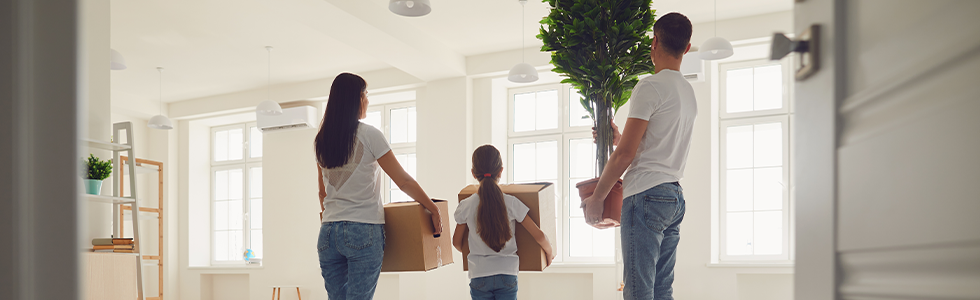 Family happy to be in their new home