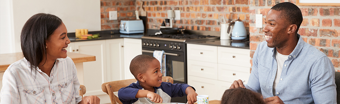 family eating at table together
