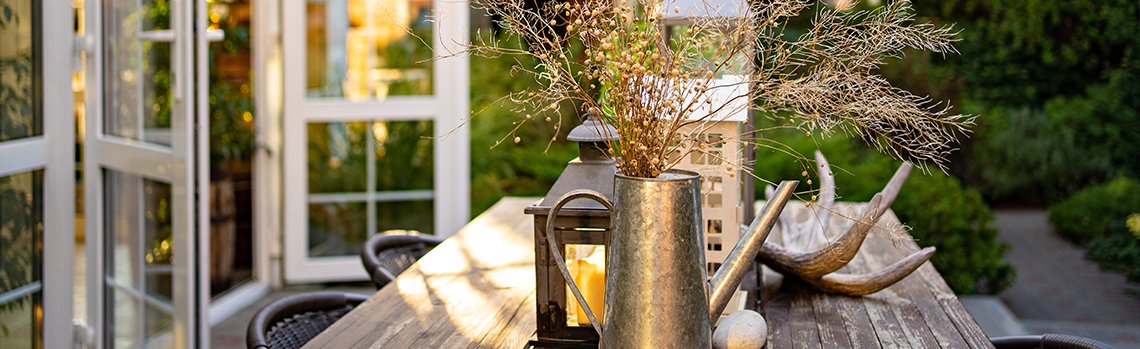 Lunch outside in a garden courtyard with lights